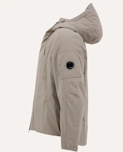 C.p. Company Relaxed-fit Minimalist Jacket With Adjustable Hood In Neutral