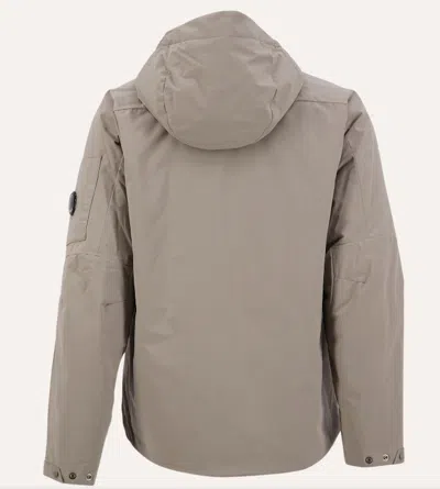 C.p. Company Relaxed-fit Minimalist Jacket With Adjustable Hood In Neutral