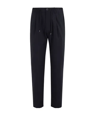 Herno Logo-plaque Button-fastening Tapered Trousers In Black