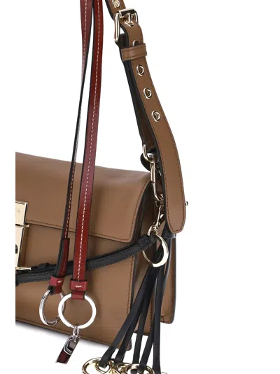 Prada Soft Sound Large Caramel Leather Bag With Charms In Brown