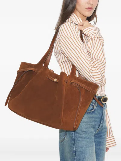 Tory Burch Romy Pebble Leather Bucket Bag In Brown