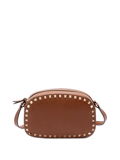 Valentino Studded Leather Crossbody Bag With Chain Strap In Brown