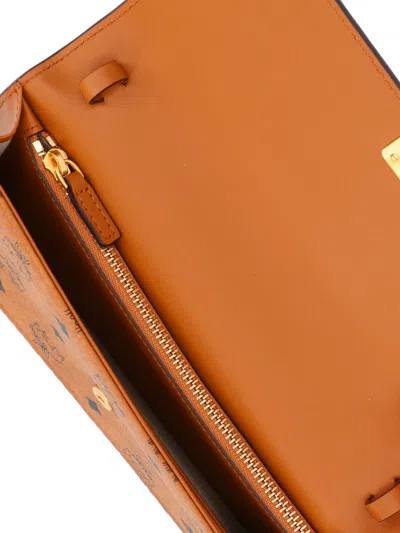 Mcm Large Wallet With Adjustable Shoulder Strap In Brown