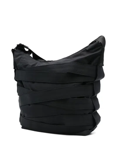 环绕式袢带单肩包