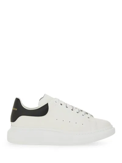 Alexander Mcqueen White And Black Low-top Sneakers With Chunky Sole And Contrasting Heel Tab In Leather Man In White