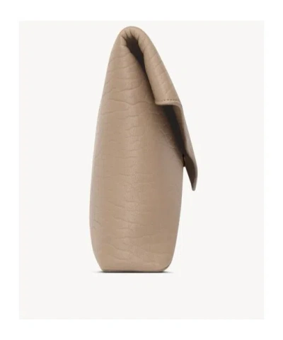 Saint Laurent Cassandre Large Envelope Pouch In Lambskin In Brown