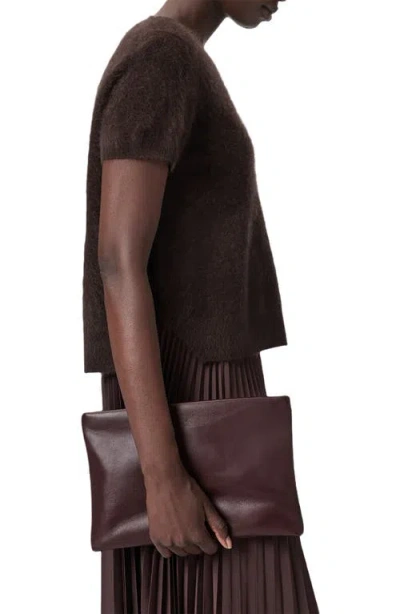 Allsaints Bettina Sheepskin Leather Clutch In Burgundy
