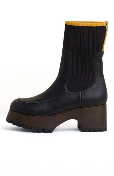 Charlotte Stone Loma Platform Lug Sole Clog Boot In Black