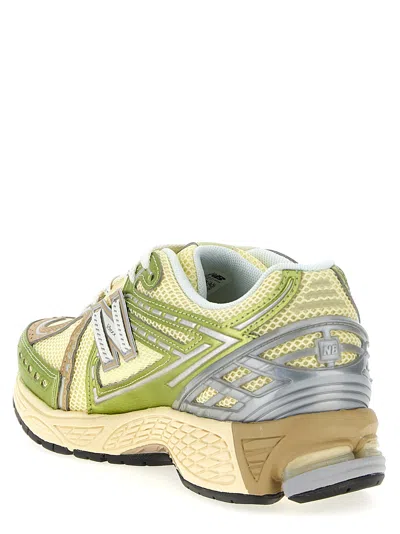 New Balance Low Top Sneakers With Mesh Upper And Reflective Accents In Yellow