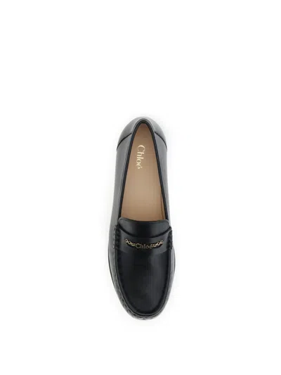 Chloé Leather Logo Chain Penny Loafers In Black