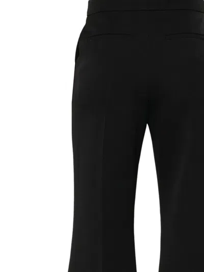 Givenchy Wool Flared Trousers In Black
