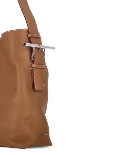 Alexander Mcqueen Adjustable Strap Leather Shoulder Bag In Brown