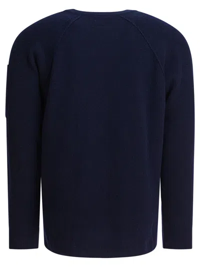 C.p. Company Crewneck Sweater With Arm Pocket And Raglan Sleeves In Blue