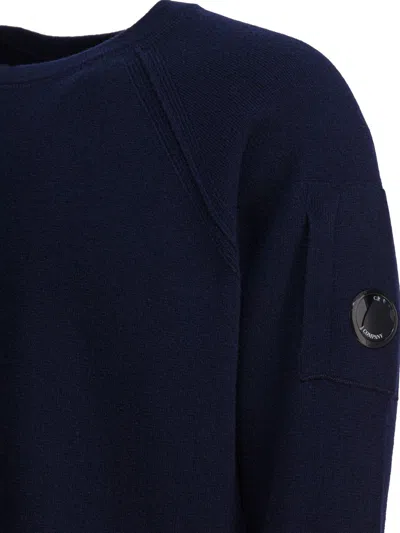 C.p. Company Crewneck Sweater With Arm Pocket And Raglan Sleeves In Blue