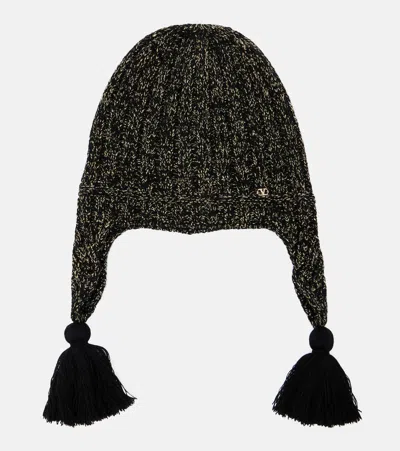 Valentino Wool Blend Beanie With Knit Texture And Tassel Embellishments In Black