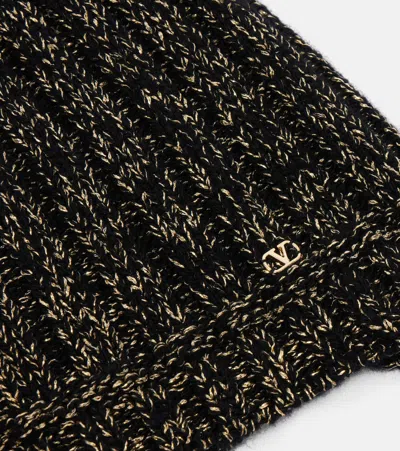 Valentino Wool Blend Beanie With Knit Texture And Tassel Embellishments In Black