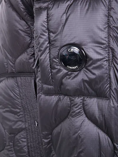 C.p. Company Black Jacket With Fixed Hood And Logo Plaque On The Sleeve In Tech Fabric Man In Black