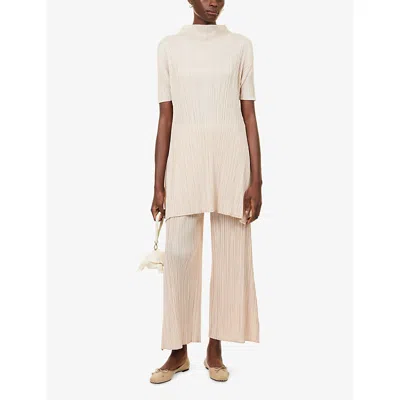 Issey Miyake Womens Light Beige Mock-neck Short-sleeve Knitted Tunic Top In White