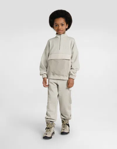 Dolce & Gabbana Dg Embossed Logo Fleece Trousers In Gray