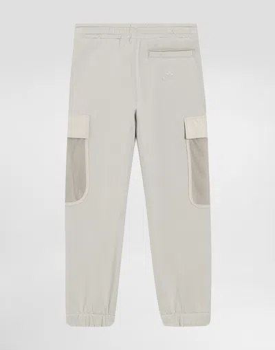 Dolce & Gabbana Dg Embossed Logo Fleece Trousers In Gray