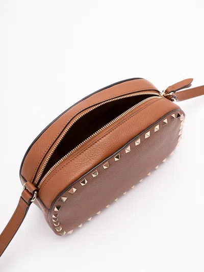 Valentino Studded Leather Crossbody Bag With Chain Strap In Brown