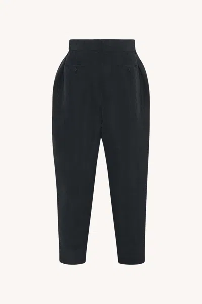 The Row Dyri Pleated Silk-shantung Tapered Pants In Black