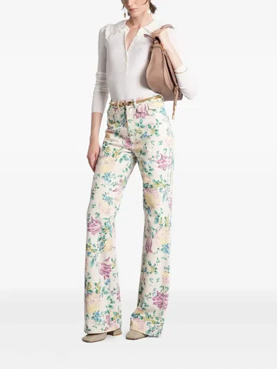 Chloé Women Flare Denim Jeans With All-over Flowers Print In Multi