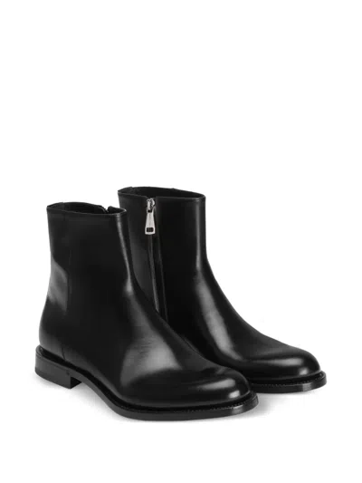 Dolce & Gabbana Zippered Leather Ankle Boots In Black