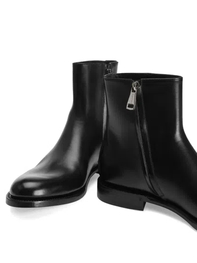Dolce & Gabbana Zippered Leather Ankle Boots In Black