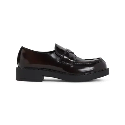 Prada Triangle Logo Chocolate Brushed Leather Loafers In Black