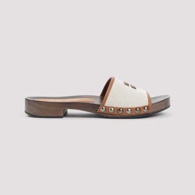 Miu Miu Canvas And Leather Studded Clog Sandals In Neutral