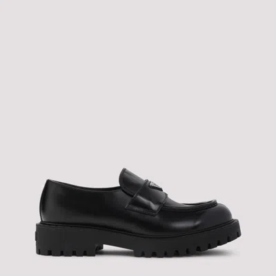 Prada Monolith Leather Loafers In Black