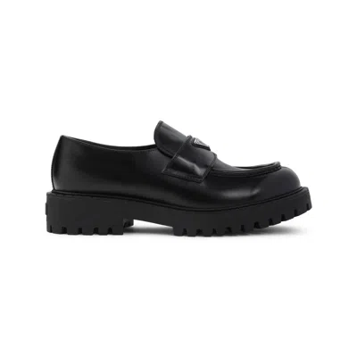 Prada Monolith Leather Loafers In Black