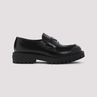Prada Monolith Leather Loafers In Black