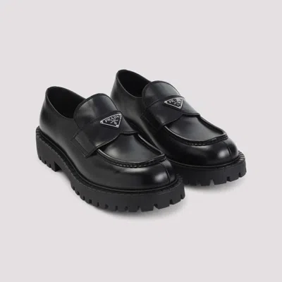 Prada Monolith Leather Loafers In Black