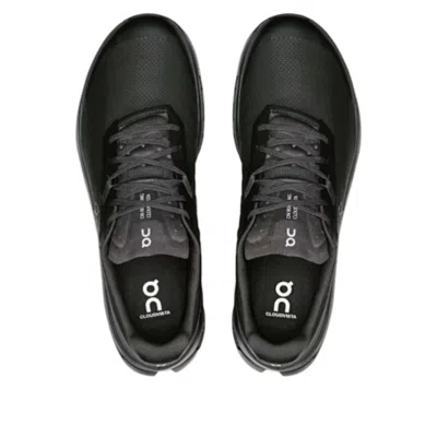 On Running Black Sneakers With Breathable Mesh Upper And Distinctive Sole In Black