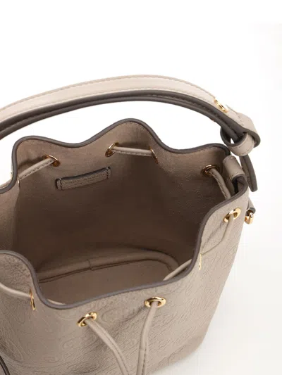 Tory Burch T Monogram Pebble Mini Bucket Bag Handbags Grey