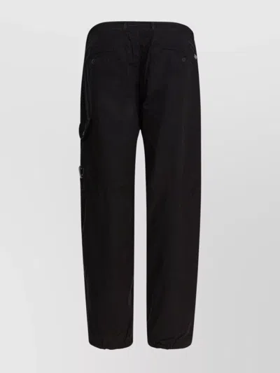 C.p. Company Trousers Featuring Various Functional Pockets In Black