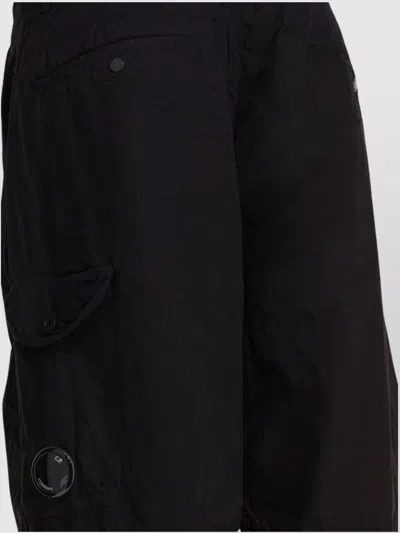C.p. Company Trousers Featuring Various Functional Pockets In Black