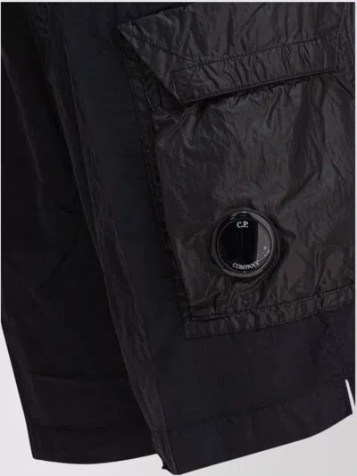 C.p. Company Black Minimalist Beach Shorts With Unique Lens Detail In Black