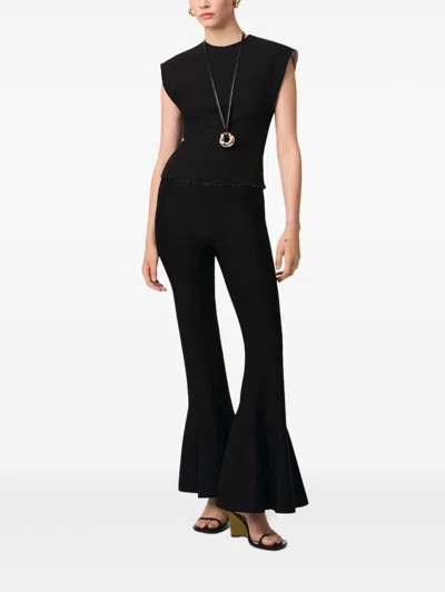 Ami Alexandre Mattiussi Fluted Trousers With Long Length And Flared Design In Black