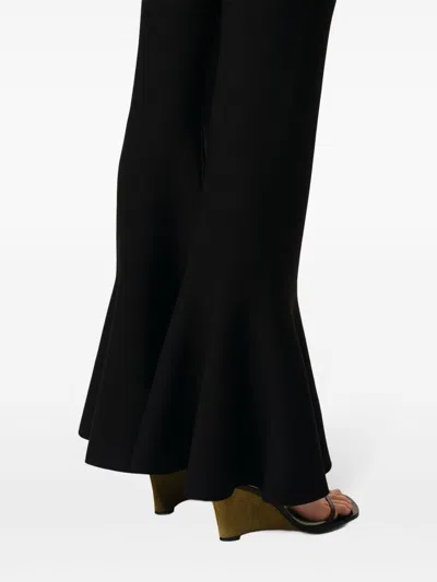 Ami Alexandre Mattiussi Fluted Trousers With Long Length And Flared Design In Black