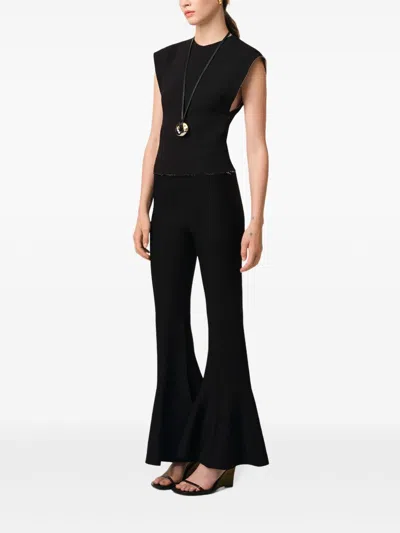 Ami Alexandre Mattiussi Fluted Trousers With Long Length And Flared Design In Black