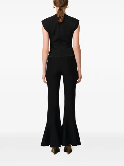 Ami Alexandre Mattiussi Fluted Trousers With Long Length And Flared Design In Black