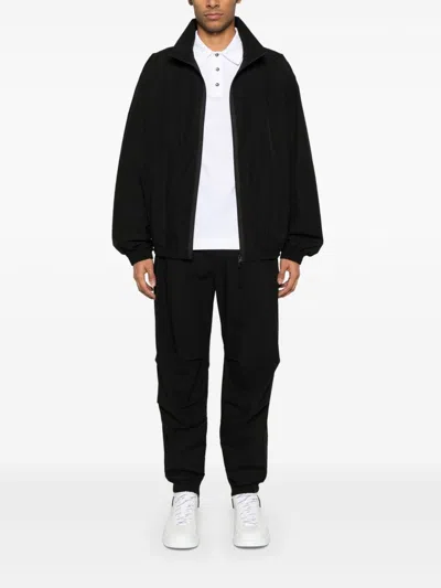 Dolce & Gabbana Black Tapered Trousers With Concealed Fastening In Black