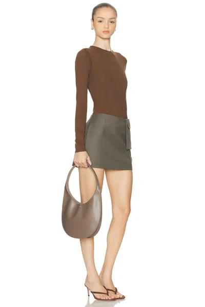 Coperni Medium Curved Shoulder Bag With Top Handle In Brown