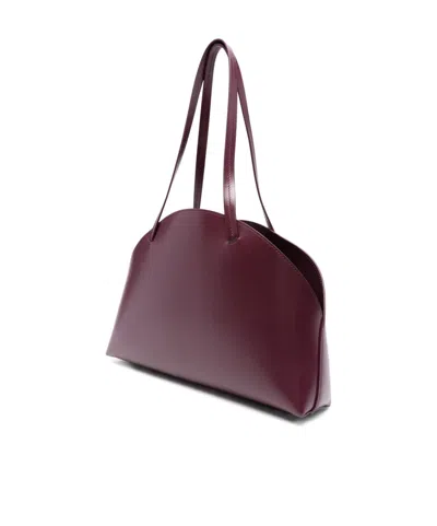 Jil Sander Medium Curved Shoulder Bag In Purple