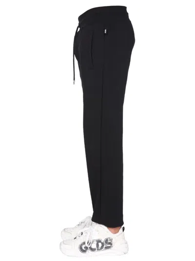 Gcds Jogging Pants With Cute Tape Logo Band In Black