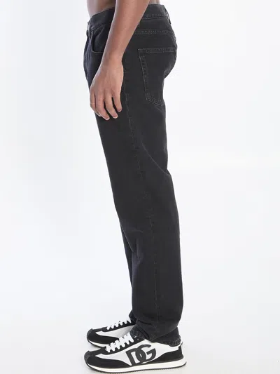 Dolce & Gabbana Denim Pants With Plaque In Black