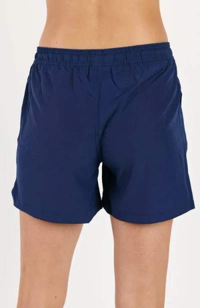 Calypsa Women's 7" Board Shorts In Blue